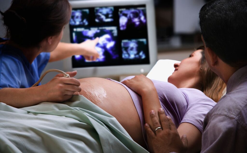 Pregnant woman at antenatal ultrasound