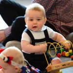Baby Prince George plays with toy