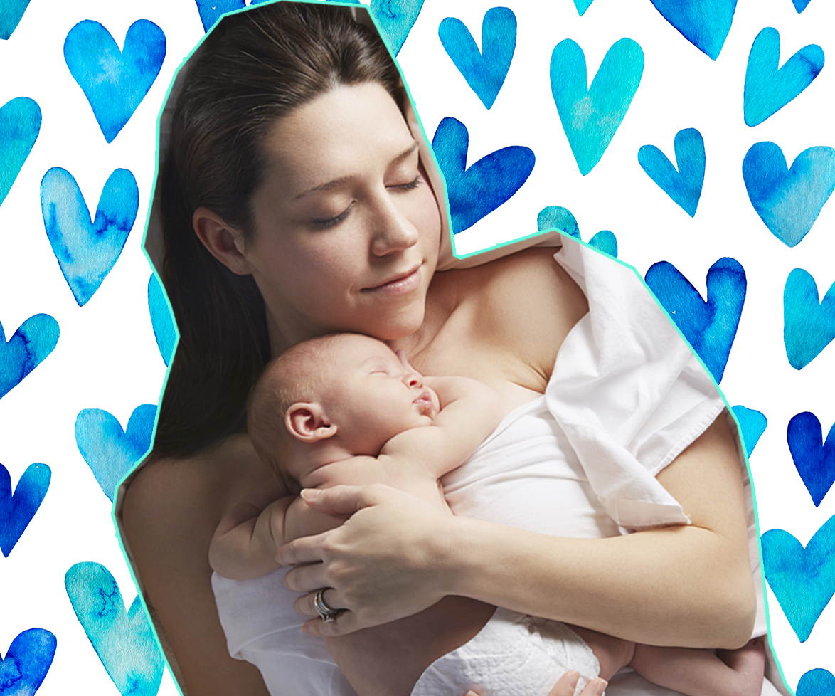 Mum sleeping with baby in bed