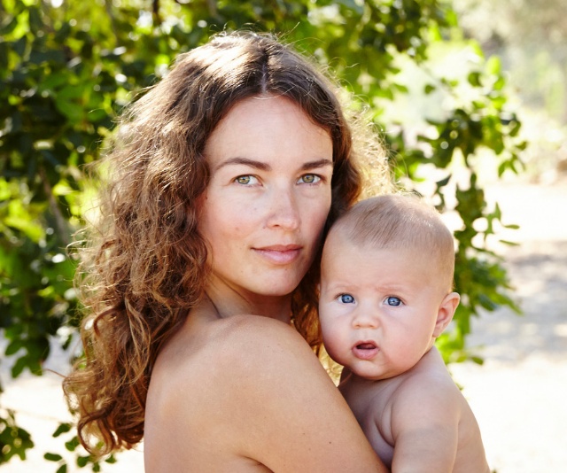 Mother and baby bare skin outdoors