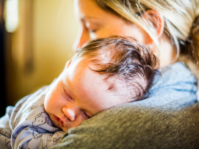 Newborn baby and mother