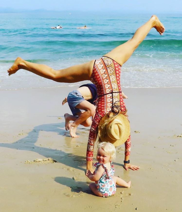 Carrie Bickmore, beach, family, cartwheel