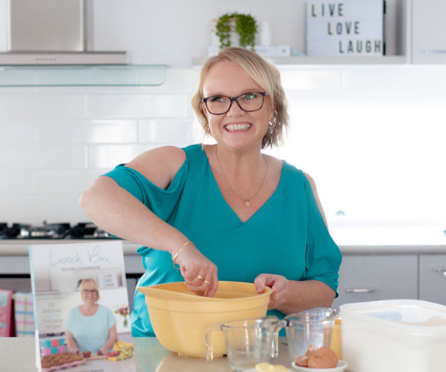 Kat Springer from The Organsied Housewife in a kitchen