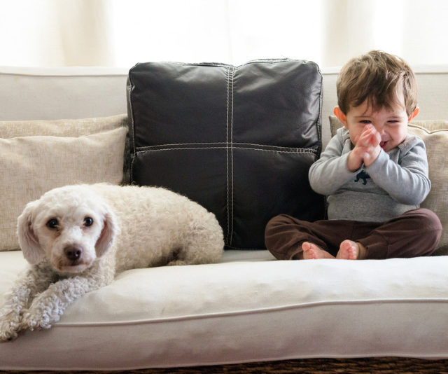baby with puppy