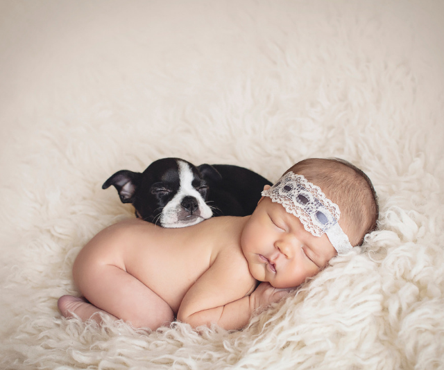 baby with puppy