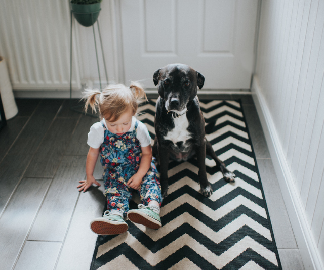 baby with puppy