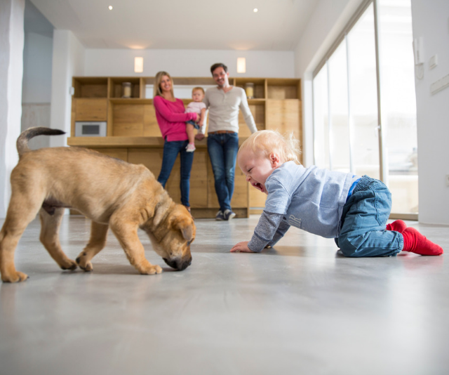 baby with puppy