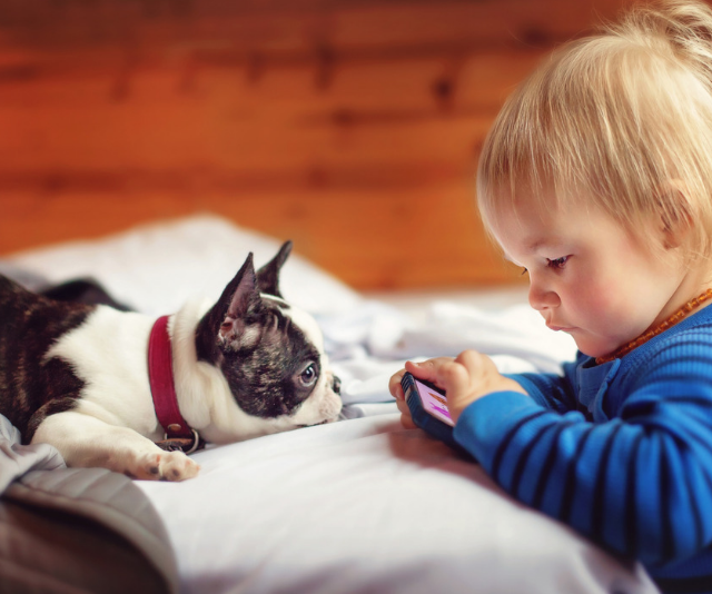 baby with puppy