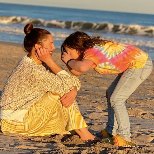 drew barrymore on the beach with daughter Olive