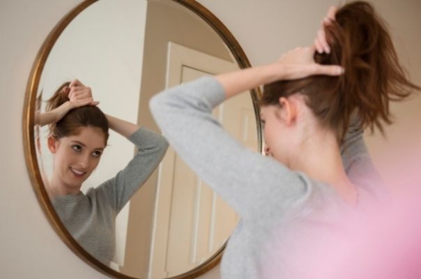 woman hair mirror