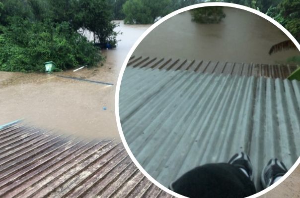 Flood crisis: Urgent calls for help as a pregnant woman is stuck on a roof as water levels rise