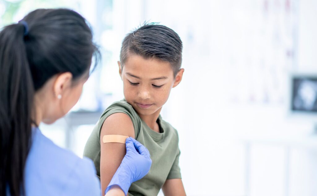 Flu vaccine: Boy after receiving flu shot