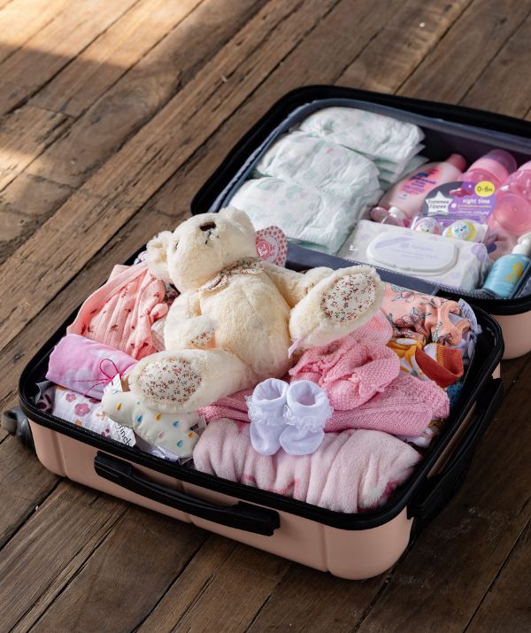 REAL LIFE “I give children in foster care a suitcase full of