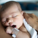 Why is newborn baby skin-to-skin contact with dads and non-birthing parents important? Here’s what the science says