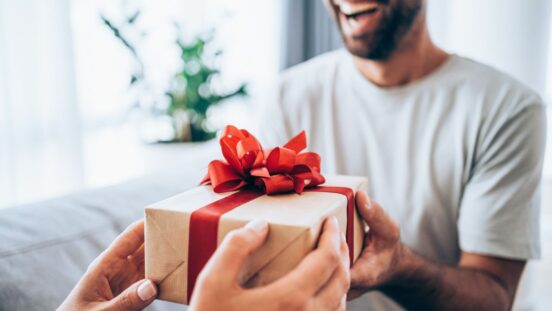 Man receiving a gift for valentine's day