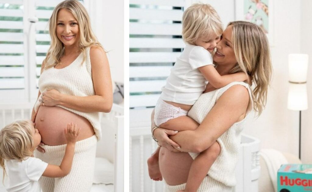 Anna pregnant and holding daughter Elle