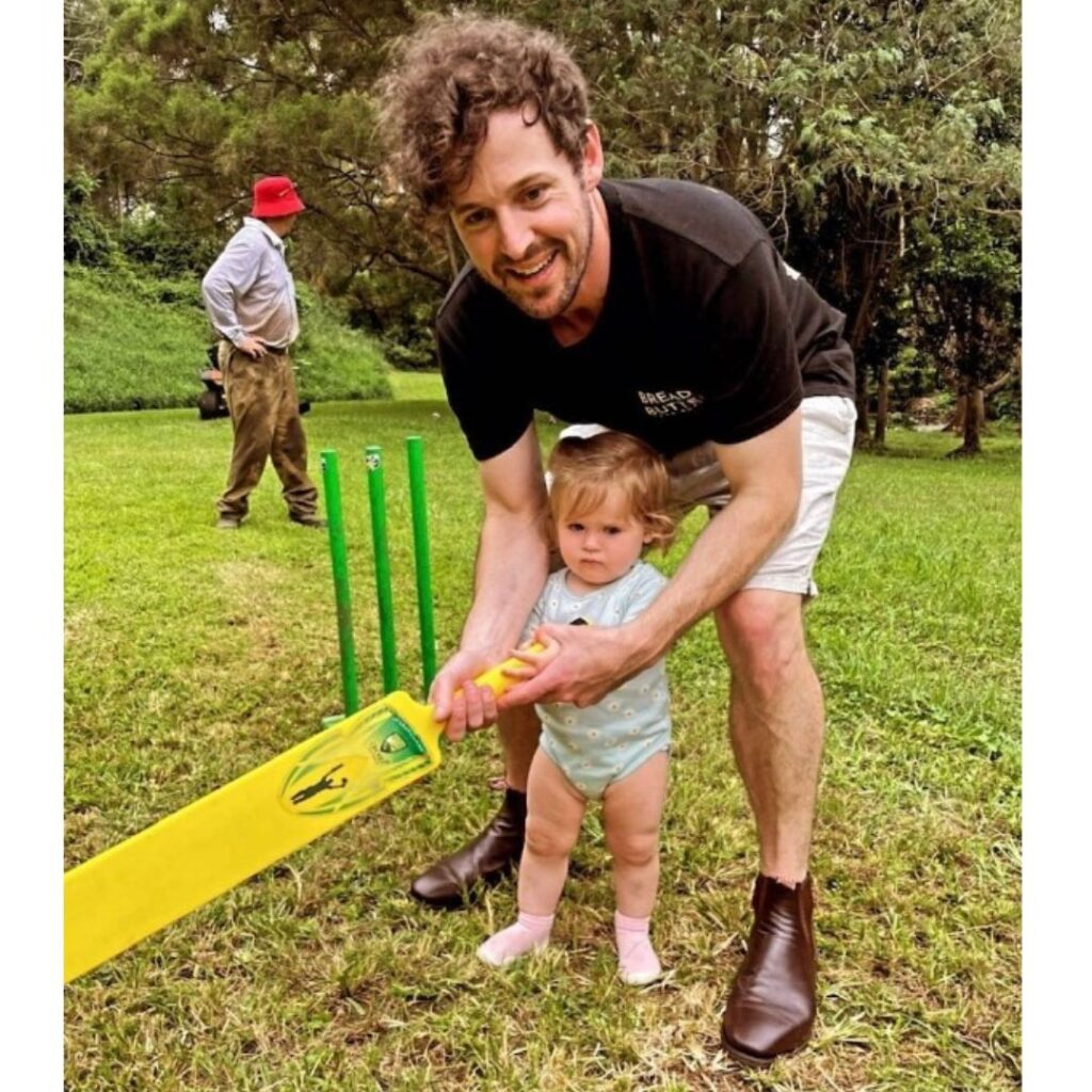 Lachy Wiggle Gillespie plays cricket with one of his daughters