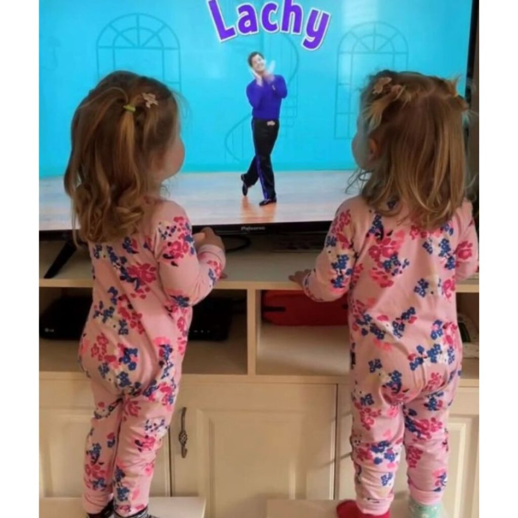 Lulu and Lottie watching the Wiggles