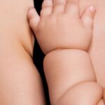 Close of chubby baby wrist and hand