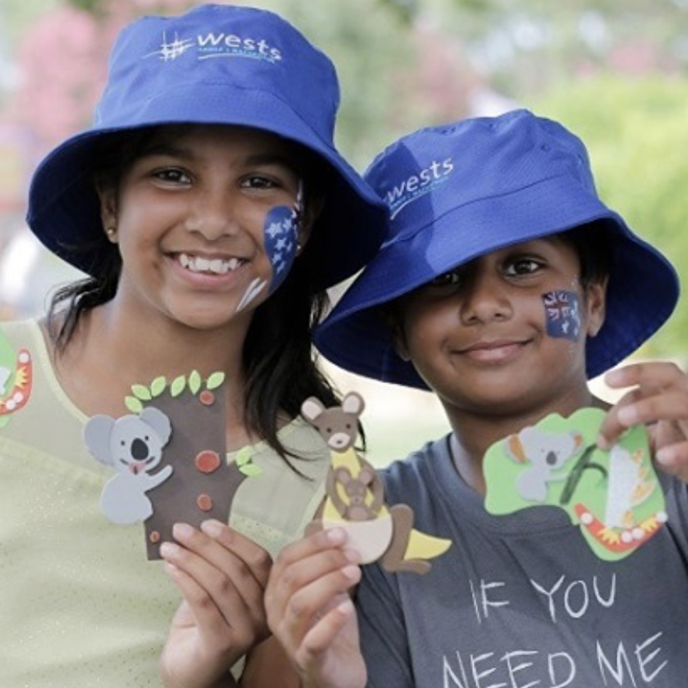 A young boy and girl enjoys arts and crafts on offer at Wests Leagues Club.