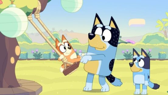 Extra long Bluey episode. Bandit pushing Bingo on a swing while Bluey watches.