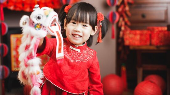 Chinese baby girl with traditional dressing up celebrate Chinese new year