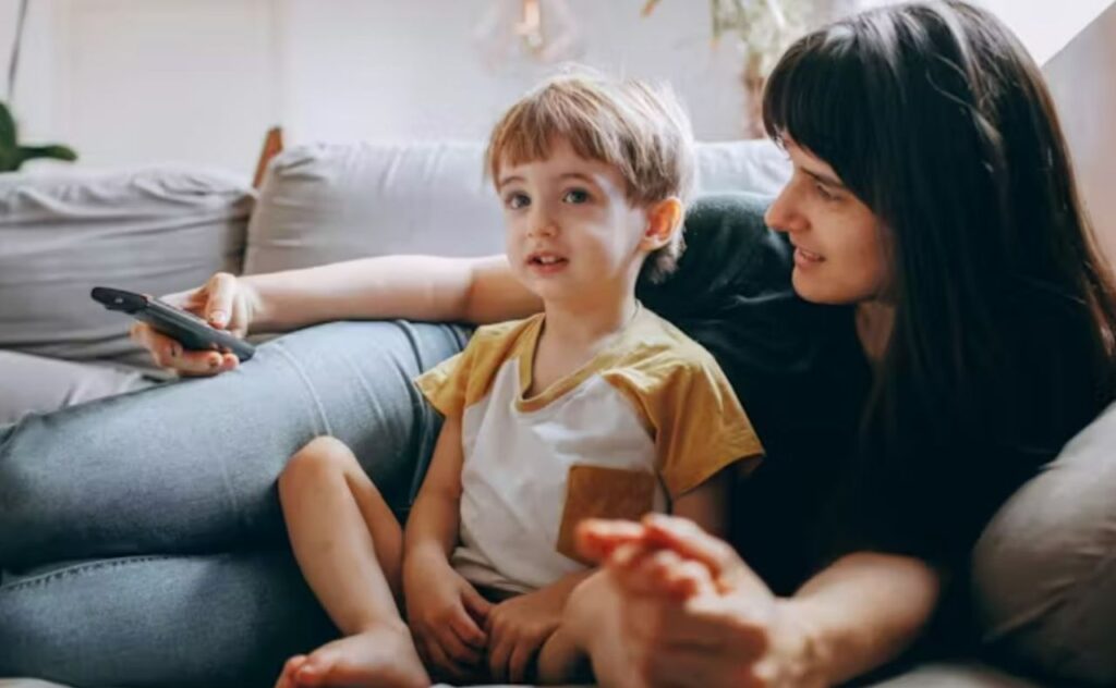 Watch Bluey with your child, and talk to them about it. Image: Helena Lopes/Pexels