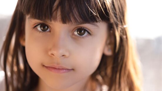 Young girl with big brown eyes