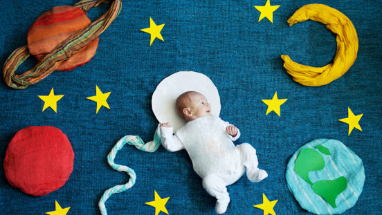 baby photoshoot with astronomy props