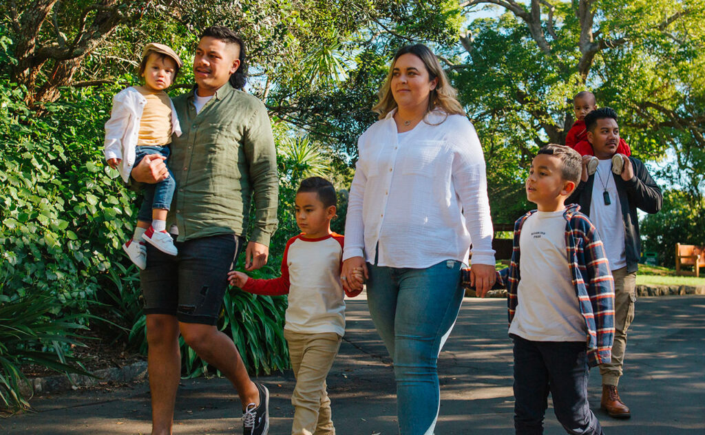 Family walking through the grounds of Auckland zoo