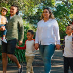 Family walking through the grounds of Auckland zoo