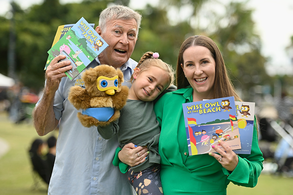 Laurie and Emma Laurence and small girl promote Kids Alive