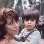 Vintage photo of a beautiful woman and her two year old boy in Mexico City, Mexico, 1976