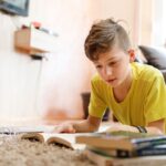 Boy reading books