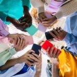 Teenagers on mobile phones