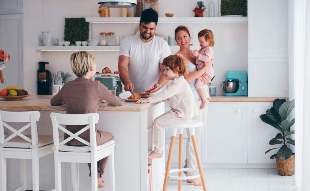 Iron Deficiency Alert: Are You and Your Kids Getting Enough. Family of five in a kitchen.