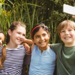 Parenting in a digital age: Four friends taking a selfie