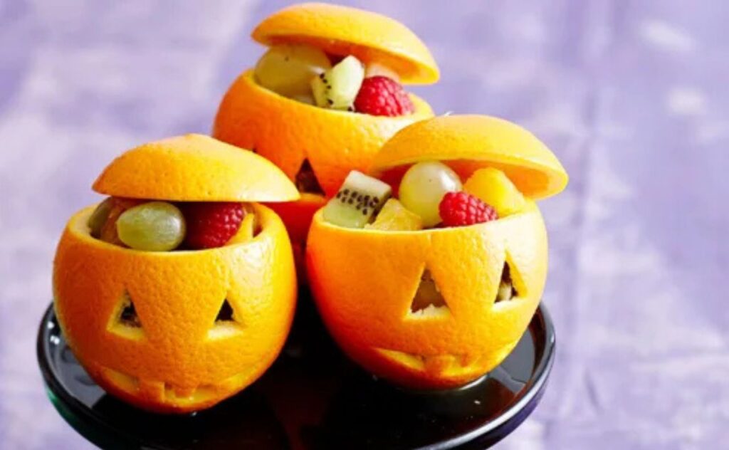 Halloween pumpkin fruit cups
