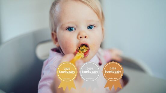 Best Feeding Device for Solids Toddler girl in high chair eating