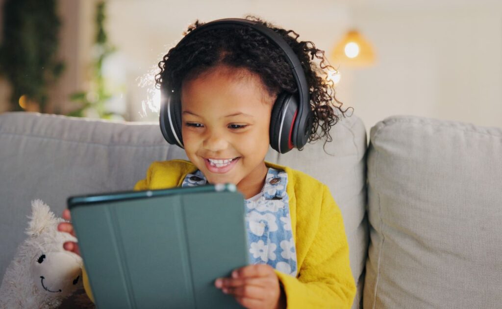 Apple safety features for children: Girl on ipad