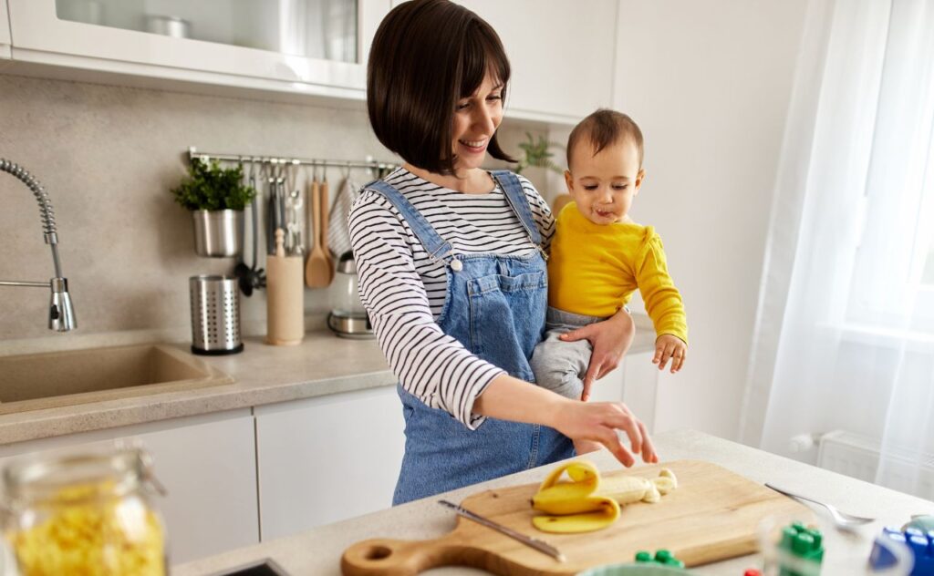 Toddler meltdowns: Mum preparing banana for toddler