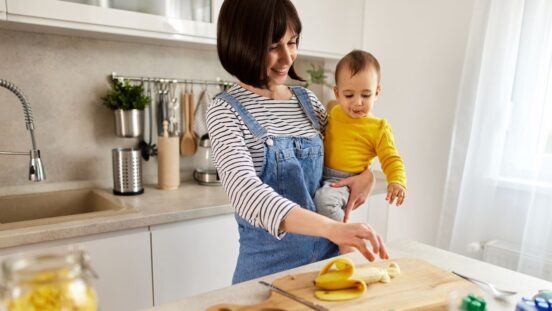 Toddler meltdowns: Mum preparing banana for toddler