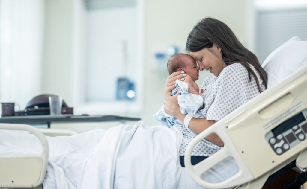 Mother and newborn baby in hospital
