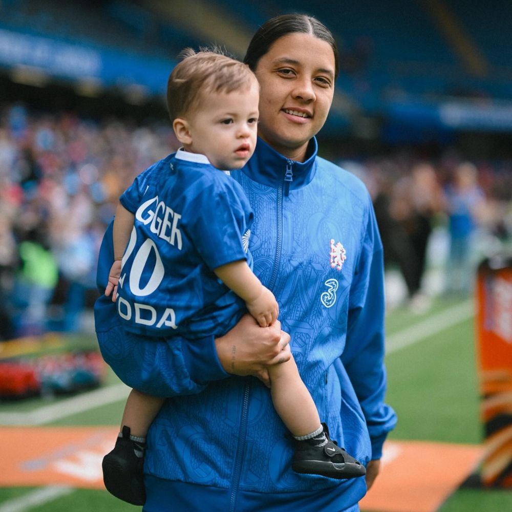 Sam Kerr with son Jagger after her final game with Chelsea