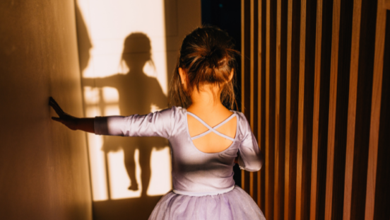 little girl in ballet outfit