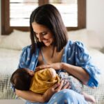 Feeding: Mother breastfeeding baby