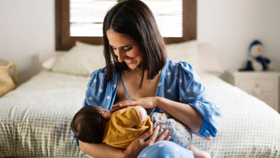 Feeding: Mother breastfeeding baby
