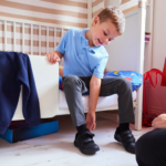 Boy getting ready for school