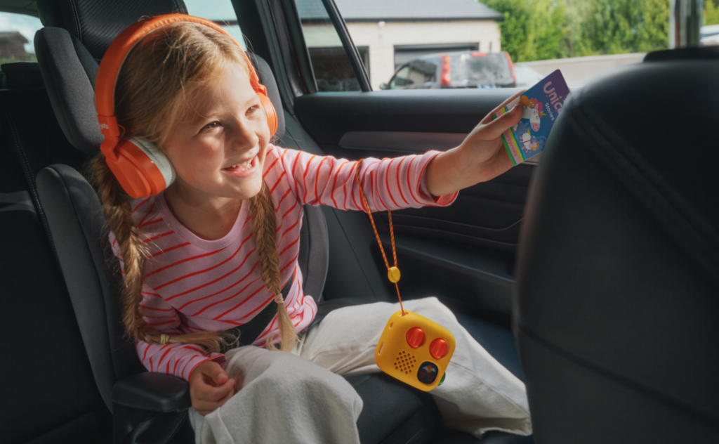 Girl listening to yoto in car